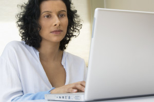 Woman Using Laptop